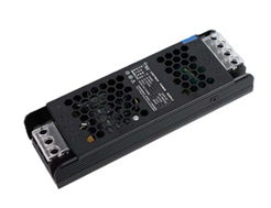 An industrial power supply unit with a black aluminum housing, featuring terminal blocks on both ends and a honeycomb heat sink design on the top surface.
