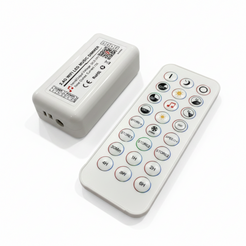 A white rectangular remote control with round buttons lies next to its matching white power adapter on a gray textured surface.